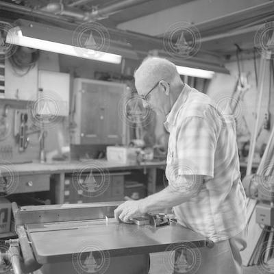 Stan Eldridge using a table saw.
