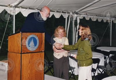 John Farrington and Judy McDowell congratulating Liz Minor.