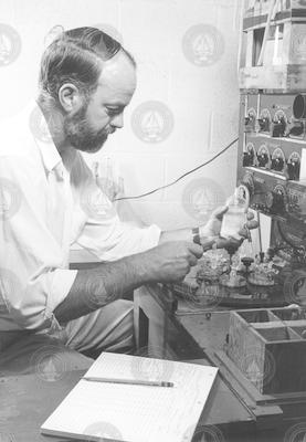 Charles "Dana" Densmore at work in his laboratory.