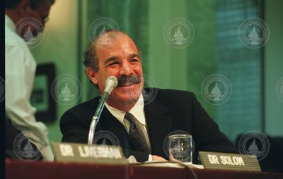 Andy Solow testifying before a Senate committee