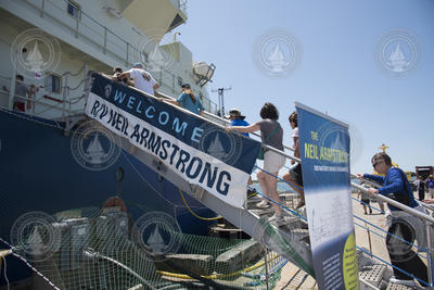Public tour guests boarding the gangway on R/V Neil Armstrong.