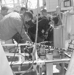 Group working on deck with camera