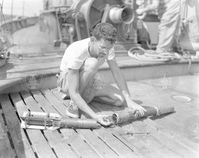 William Shultz taking apart a BT on deck of the Atlantis.