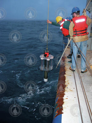 Ken Buesseler and Jim Valdes deploy a Neutrally Buoyant Sediment Trap.