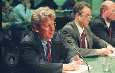 Bill Curry and Philip Mote speaking at a Senate hearing