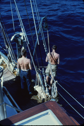 Two men working on deck