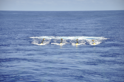Air guns at the surface being towed over the Mariana Trench.