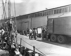 Unloading the Barnes camera from a Navy truck