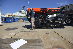 Casey Machado working on Nereid-HT out on the WHOI dock.
