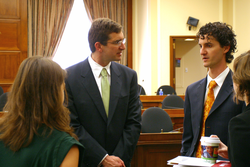 Scott Doney talking with attendees prior to hearing.