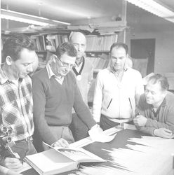 Arthur Miller working with group at chart table