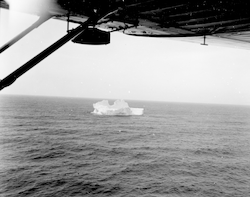 Iceberg in water, seen from PBY aircraft in Gander, Newfoundland