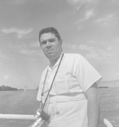 Joe Ribeiro on deck of Atlantis II with camera