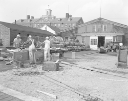 People working outside the Penzance garage.