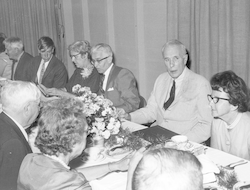 Columbus Iselin, Paul Fye and others attending dinner.