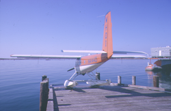 Heliocourier plane stowed on Dyer's dock.