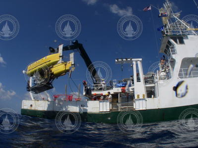 HROV Nereus suspended from R/V Cape Hatteras's crane during tests.
