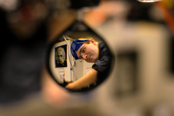 Nick Loomis working in the lab, as seen through a micro lens.
