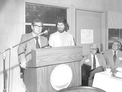 John Steele (at podium), Peter Ortner, Paul Fye, Bob Morse