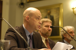 Robert Evans speaking at Congressional hearing.