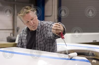 Vic Miller painting Alvin syntactic foam pieces.