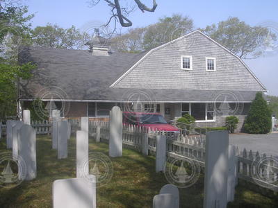 Carriage House with pet cemetary in view.