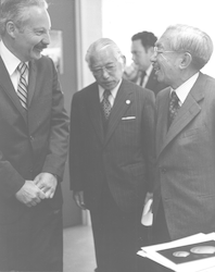 Howard Sanders talking with Emperor Hirohito.