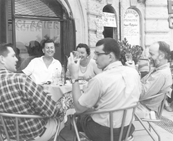 Group sitting in outside cafe in Monaco