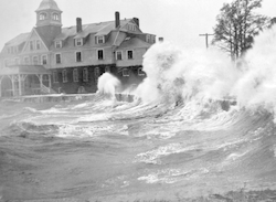 1938 hurricane surge over sea wall in Woods Hole. NOAA Fisheries.