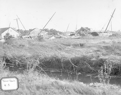 Boats scattered on shore at Silver Beach after the hurricane of 1938.