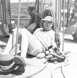 Willard Dow taking a break on deck of Atlantis.