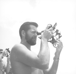 Mike Palmieri aboard Atlantis II using a sextant