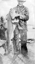 William C. Schroeder holding fish