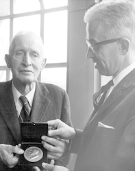 Henry Bigelow and Paul Fye holding the FIRST Bigelow Medal.