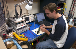 Keenan Ball working on acoustic modem project.