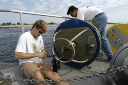 Postdoc Malcolm Scully (VIMS) and Jim Lerczak with a recovered mooring.