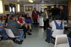 Susan Avery speaking with crew of the Knorr in mess hall.