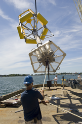 Will Ostrom and Dan Duffany testing a ASIS Buoy at WHOI dock.