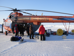 Jeff Pietro and Kris Newhall loading up MI-8 helicopter.
