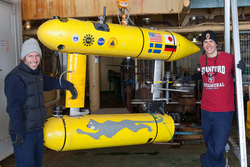 Clay Kunz and Peter Kimball with AUV Jaguar.