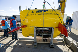 AUV Sentry in position for launch at the WHOI dock.