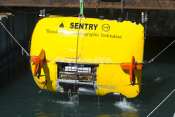 Sentry is hoisted out of the dock well during tests.