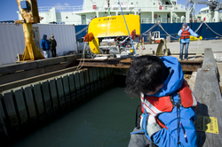 Justin Fujii and Hannah Baker launch Sentry during dock tests.