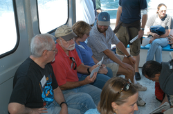 Guests on board the Minuteman during the transit to MVCO.