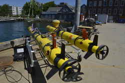 Two REMUS 600s stationed at the WHOI dock prior to testing.
