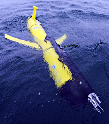 AUV Glider outfit with sensors at the water surface.