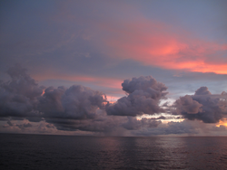 Cloud and ocean surface interaction on the horizon.