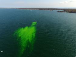 Aerial view of R/V Discovery performing REMUS oil spill tracking tests.
