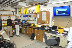 Frank Herr, RADM Nevin Carr, and Tom Austin in REMUS lab.