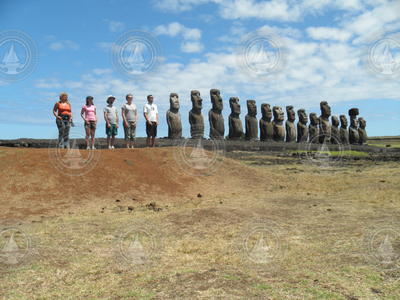 Researchers standing next to Moai statues in Rapa Nui National Park.